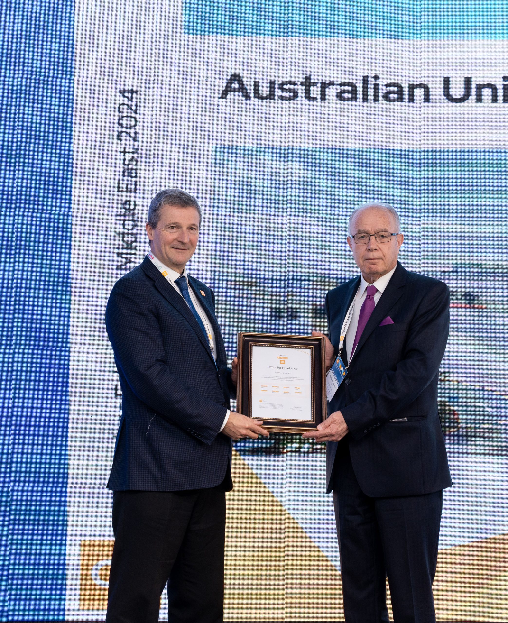 prof. Isam receiving the award
