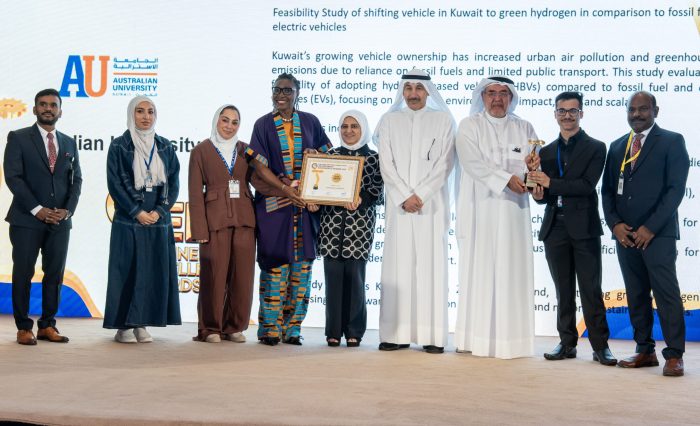 Gold award winning team on stage