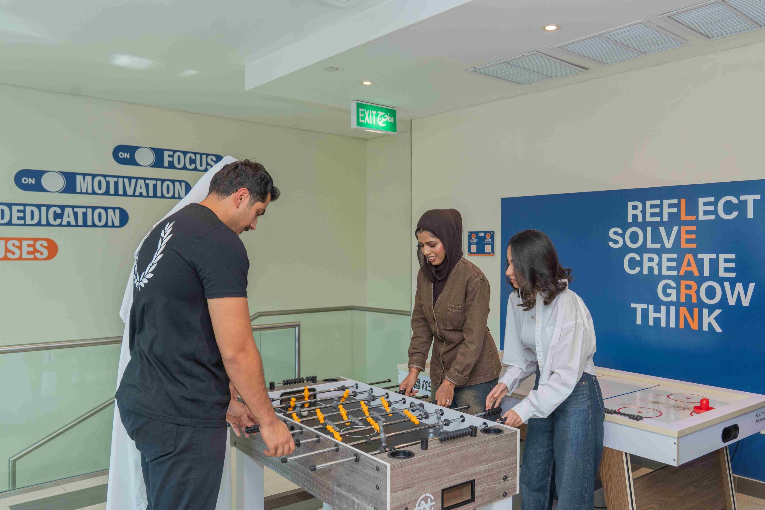 Students playing baby foot at the Student Engagement Centre